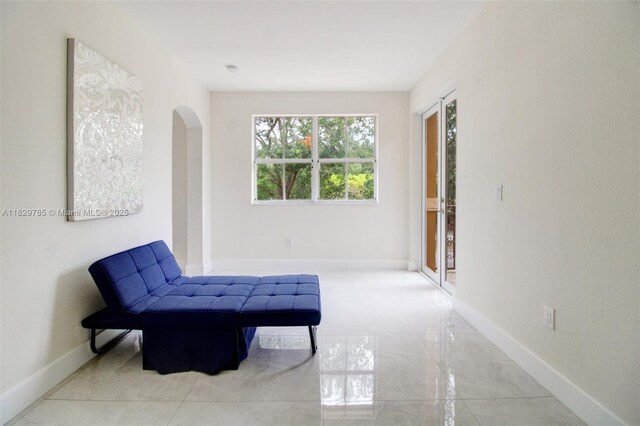 15445 SW 26th Ter, Miami, FL 33185 - sitting room with arched walkways and baseboards