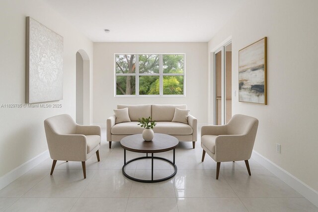15445 SW 26th Ter, Miami, FL 33185 - living room with arched walkways and light tile patterned floors