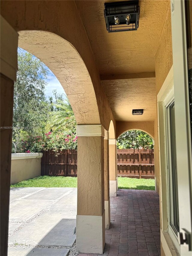 15445 SW 26th Ter, Miami, FL 33185 - fenced backyard featuring a patio area