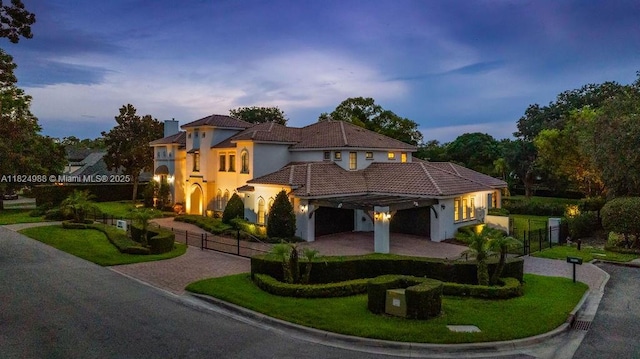 2211 Azalea Pl, Winter Park, FL 32789 - mediterranean / spanish-style home featuring curved driveway, a fenced front yard, stucco siding, a gate, and a chimney