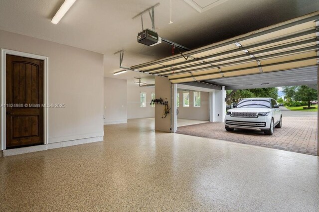 2211 Azalea Pl, Winter Park, FL 32789 - garage featuring a garage door opener