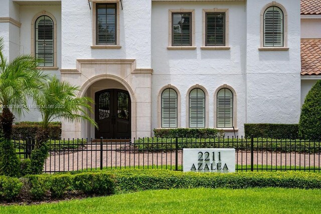 2211 Azalea Pl, Winter Park, FL 32789 - doorway to property with stucco siding