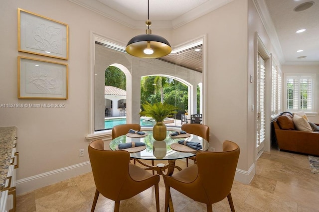 2211 Azalea Pl, Winter Park, FL 32789 - dining room with crown molding, light stone finish flooring, and recessed lighting