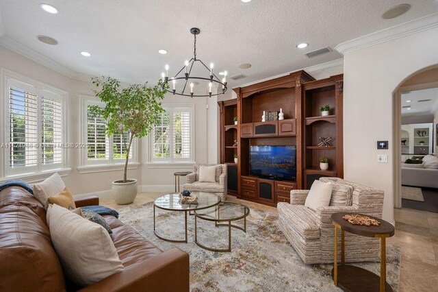 2211 Azalea Pl, Winter Park, FL 32789 - living area with ornamental molding, recessed lighting, arched walkways, and a chandelier