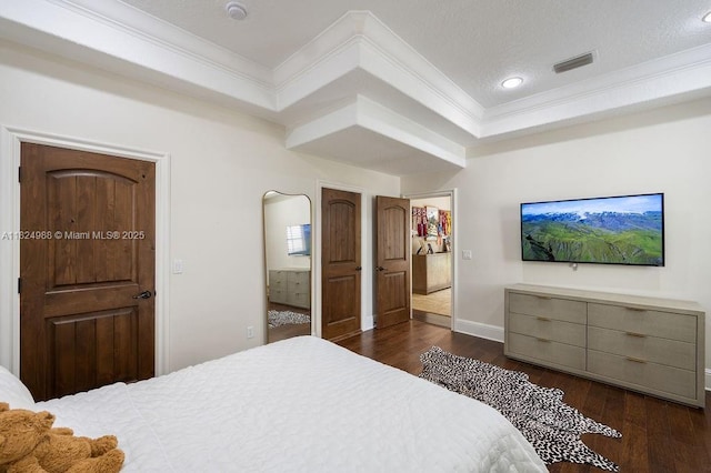 2211 Azalea Pl, Winter Park, FL 32789 - bedroom with crown molding, dark wood finished floors, recessed lighting, and ensuite bath