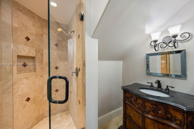 2211 Azalea Pl, Winter Park, FL 32789 - bathroom featuring a stall shower, vaulted ceiling, and vanity