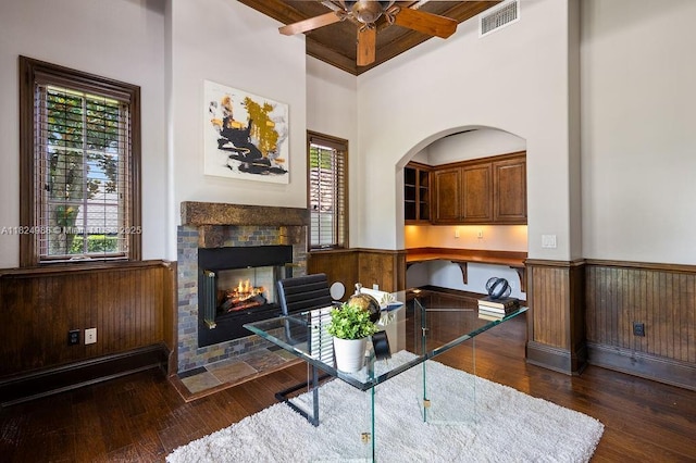 2211 Azalea Pl, Winter Park, FL 32789 - living area featuring ceiling fan, a fireplace, hardwood / wood-style flooring, wainscoting, and beam ceiling