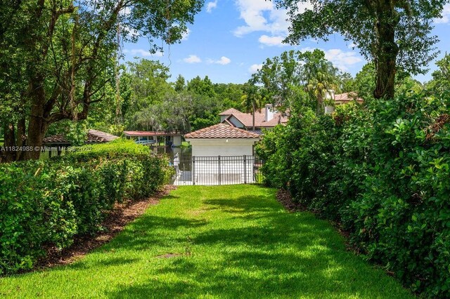 2211 Azalea Pl, Winter Park, FL 32789 - view of yard with a garage