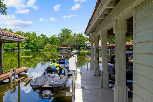 2211 Azalea Pl, Winter Park, FL 32789 - dock with boat lift and a water view