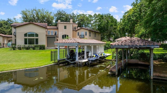 2211 Azalea Pl, Winter Park, FL 32789 - dock with boat lift, a water view, and a lawn