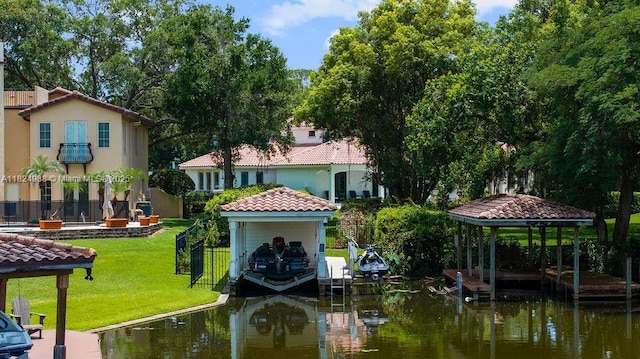 2211 Azalea Pl, Winter Park, FL 32789 - dock featuring boat lift, a gazebo, and a water view