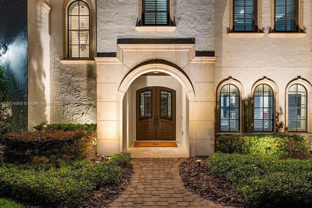 2211 Azalea Pl, Winter Park, FL 32789 - property entrance with stucco siding and french doors