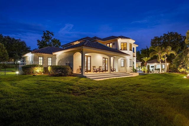 2211 Azalea Pl, Winter Park, FL 32789 - back of house with a tile roof and stucco siding