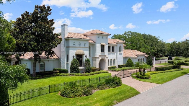 2211 Azalea Pl, Winter Park, FL 32789 - mediterranean / spanish home featuring stucco siding, a tiled roof, and a chimney