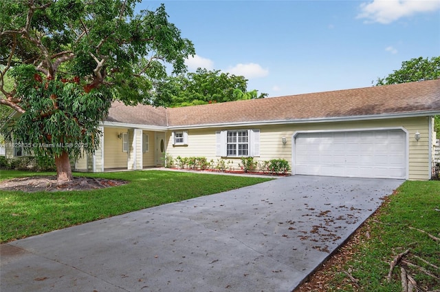 14861 SW 149th St, Miami, FL 33196 - ranch-style house featuring concrete driveway, a garage, and a front lawn