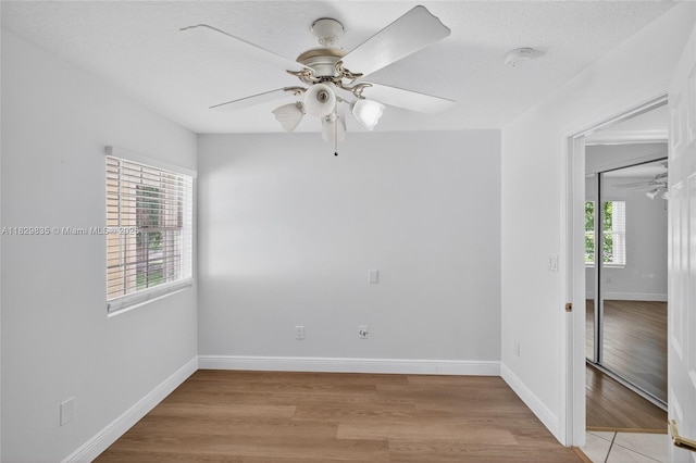 14861 SW 149th St, Miami, FL 33196 - unfurnished room with ceiling fan, light wood-style floors, and a smoke detector