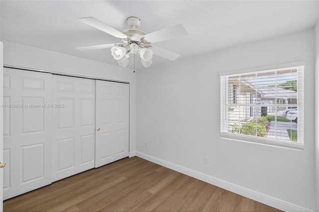 14861 SW 149th St, Miami, FL 33196 - unfurnished bedroom featuring wood finished floors, a closet, and ceiling fan