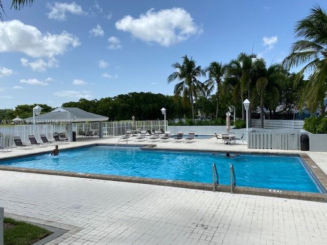 14861 SW 149th St, Miami, FL 33196 - community pool featuring a patio