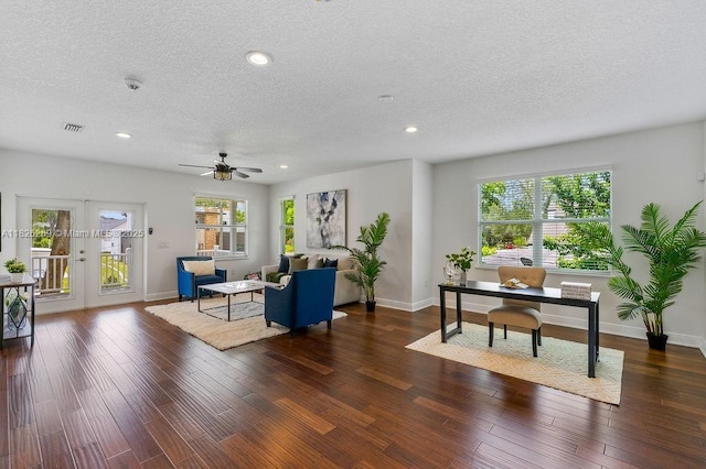 2607 Lafayette Ave, Winter Park, FL 32789 - living area with a textured ceiling, french doors, plenty of natural light, recessed lighting, and wood finished floors