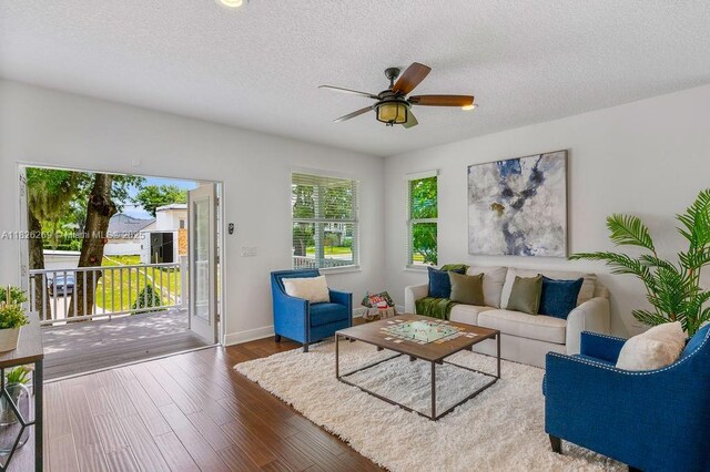 2607 Lafayette Ave, Winter Park, FL 32789 - living room with a textured ceiling, a ceiling fan, and wood finished floors