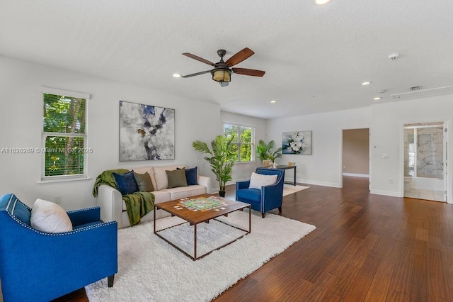 2607 Lafayette Ave, Winter Park, FL 32789 - living room featuring wood finished floors, recessed lighting, a ceiling fan, and a textured ceiling