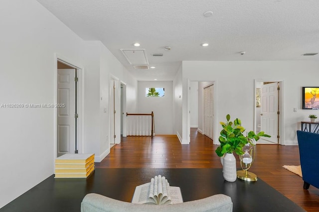 2607 Lafayette Ave, Winter Park, FL 32789 - living room with wood finished floors, attic access, a textured ceiling, and recessed lighting