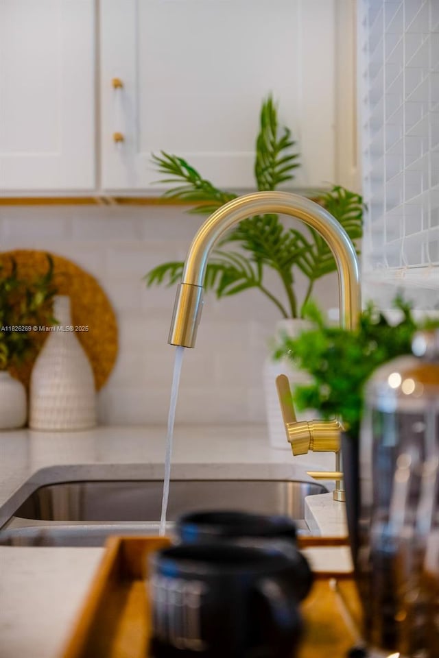 2607 Lafayette Ave, Winter Park, FL 32789 - kitchen view of white cabinetry and a sink