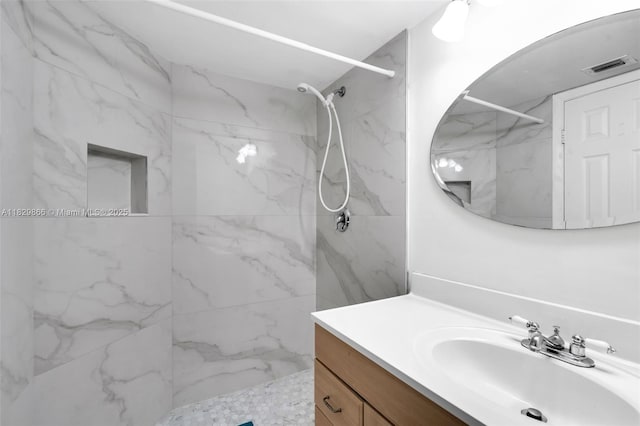 2106 S Cypress Bend Dr Unit 203, Pompano Beach, FL 33069 - bathroom with vanity and a marble finish shower