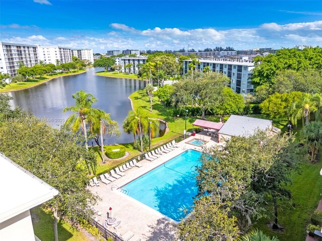 2106 S Cypress Bend Dr Unit 203, Pompano Beach, FL 33069 - community pool with a community hot tub and a water view