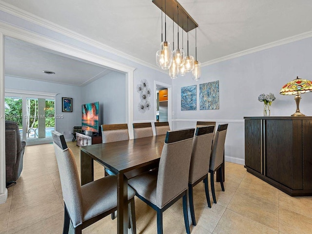 13530 SW 77th Ave, Pinecrest, FL 33156 - dining space with a chandelier, crown molding, and light tile patterned floors