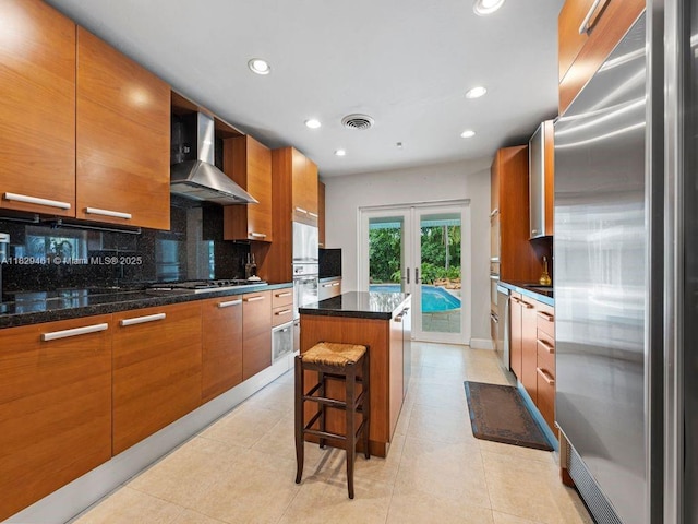 13530 SW 77th Ave, Pinecrest, FL 33156 - kitchen with appliances with stainless steel finishes, wall chimney exhaust hood, modern cabinets, french doors, and recessed lighting