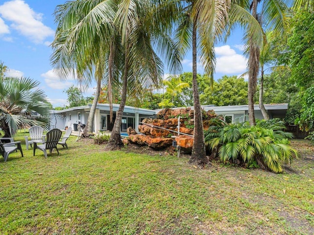 13530 SW 77th Ave, Pinecrest, FL 33156 - back of property with a yard