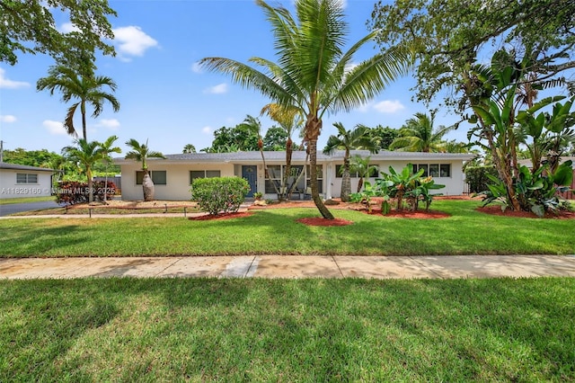 6201 SW 3rd St, Plantation, FL 33317 - single story home with stucco siding and a front lawn