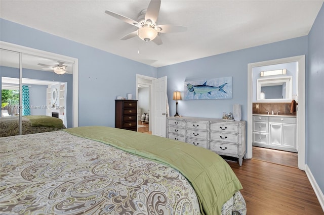 6201 SW 3rd St, Plantation, FL 33317 - bedroom featuring wood finished floors, a closet, a ceiling fan, and ensuite bath