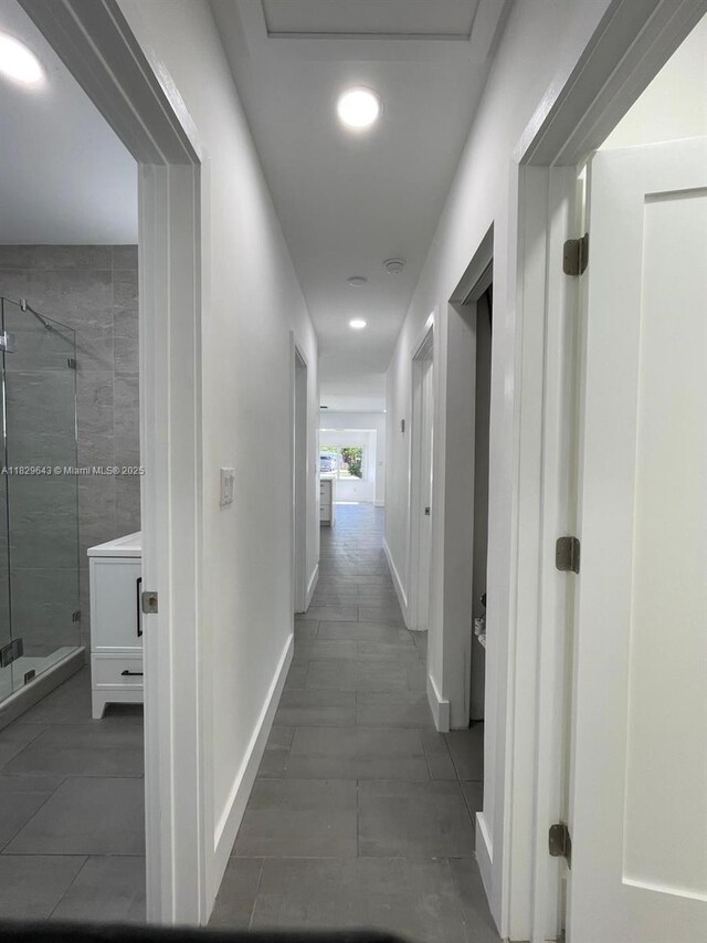 1401 NE 178th St, North Miami Beach, FL 33162 - hall featuring recessed lighting and tile patterned floors