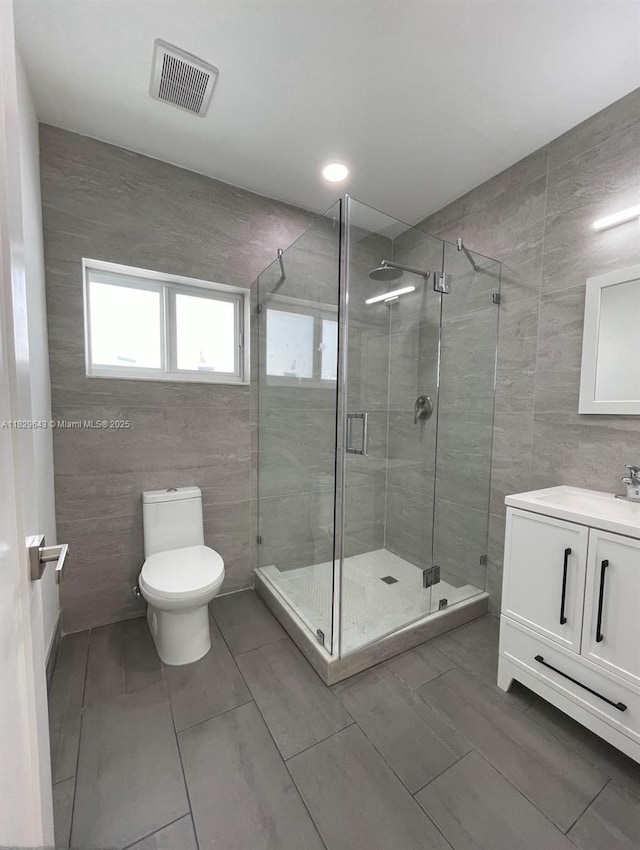1401 NE 178th St, North Miami Beach, FL 33162 - full bath with tile walls, vanity, and a stall shower