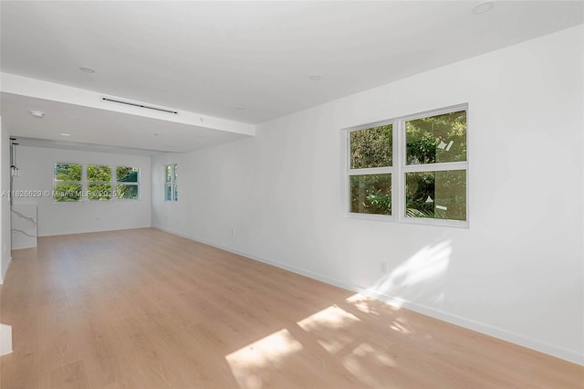 844 SE 12th Ct Unit 8, Fort Lauderdale, FL 33316 - empty room featuring light wood-style floors and baseboards