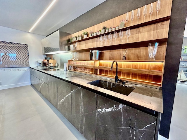 2301 Collins Ave Unit 1634/1635, Miami Beach, FL 33139 - bar area with black electric cooktop and finished concrete flooring
