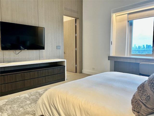 2301 Collins Ave Unit 1634/1635, Miami Beach, FL 33139 - bedroom with baseboards and a city view