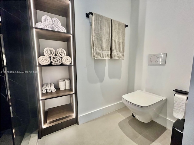2301 Collins Ave Unit 1634/1635, Miami Beach, FL 33139 - bathroom with toilet and baseboards