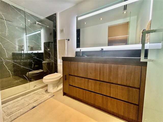 2301 Collins Ave Unit 1634/1635, Miami Beach, FL 33139 - bathroom featuring a marble finish shower and vanity