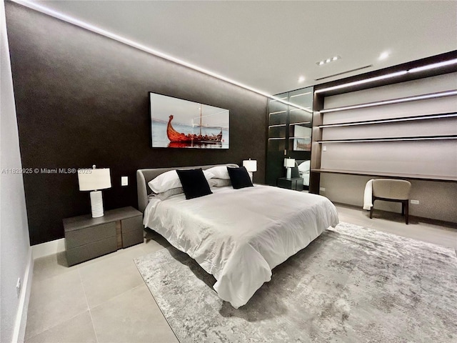 2301 Collins Ave Unit 1634/1635, Miami Beach, FL 33139 - tiled bedroom with baseboards