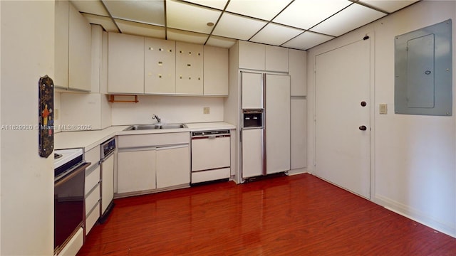 11113 Biscayne Blvd Unit 2056, Miami, FL 33181 - kitchen featuring white appliances, electric panel, light countertops, dark wood-type flooring, and a paneled ceiling