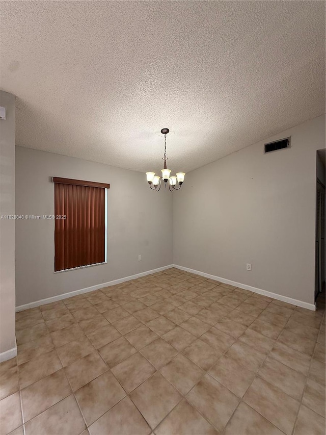 19926 NW 67th Pl, Hialeah, FL 33015 - empty room featuring a chandelier and a textured ceiling