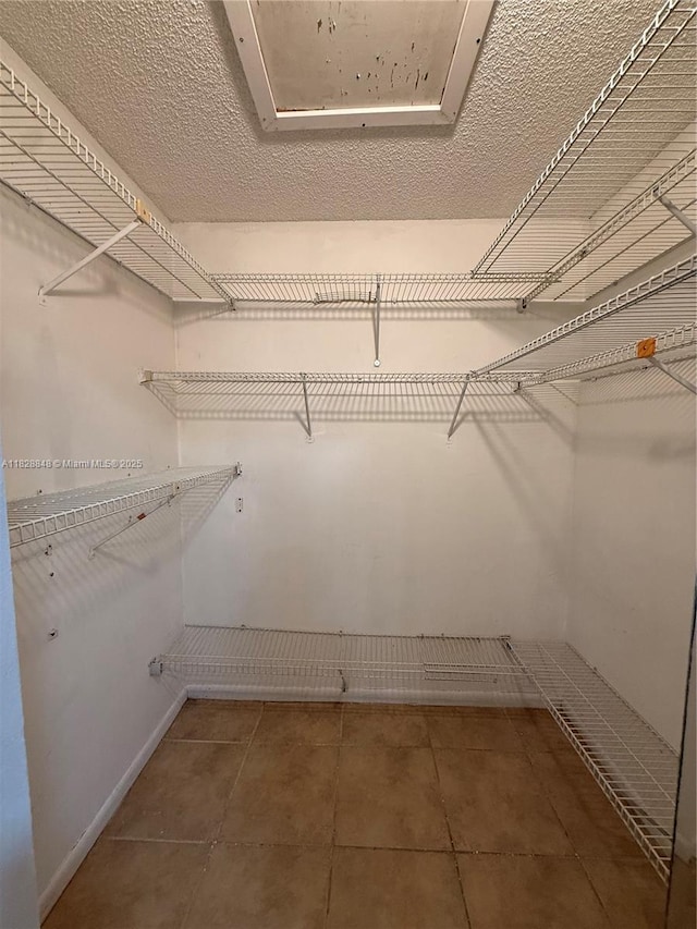 19926 NW 67th Pl, Hialeah, FL 33015 - spacious closet with tile patterned floors