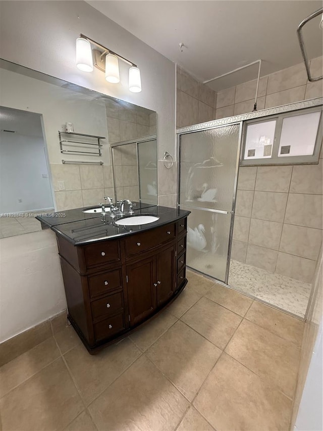 19926 NW 67th Pl, Hialeah, FL 33015 - full bathroom featuring a tile shower, vanity, and tile patterned flooring