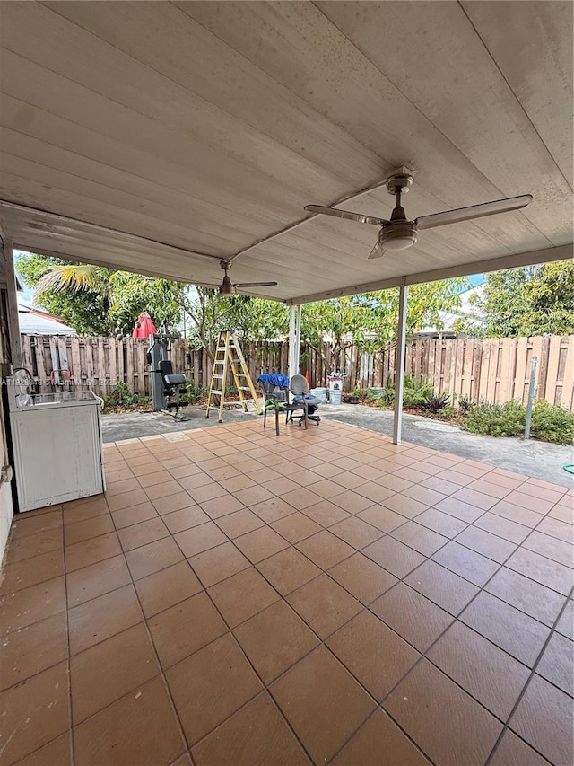 19926 NW 67th Pl, Hialeah, FL 33015 - fenced backyard featuring a patio area and ceiling fan