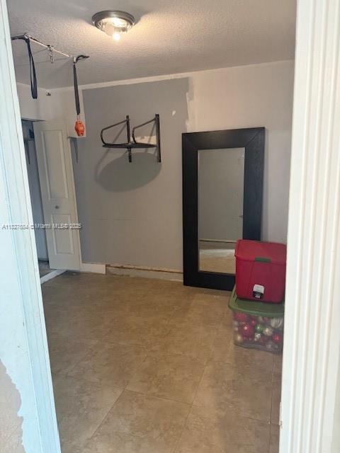 11224 Sacco Dr, Boca Raton, FL 33428 - hall with a textured ceiling