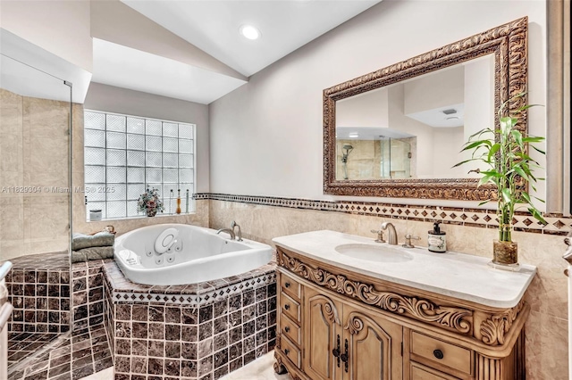 321 NW 100th Ave, Plantation, FL 33324 - bathroom featuring vanity, a jetted tub, tile walls, vaulted ceiling, and a tile shower