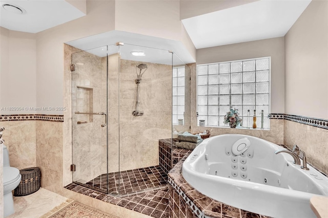 321 NW 100th Ave, Plantation, FL 33324 - full bathroom with tile walls, a jetted tub, a stall shower, and wainscoting